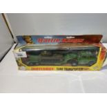 A BOXED MATCHBOX TANK TRANSPORTER AND TANK