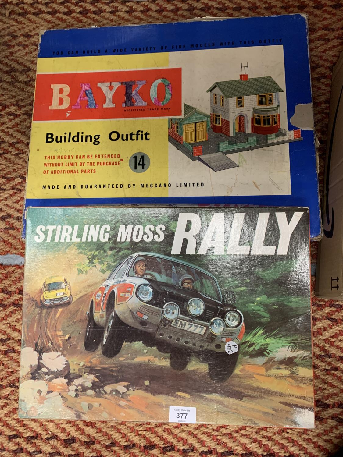 A VINTAGE BAYKO BUILDING OUTFIT MADE BY MECCANO , A STIRLING MOSS RALLY BOARD GAME