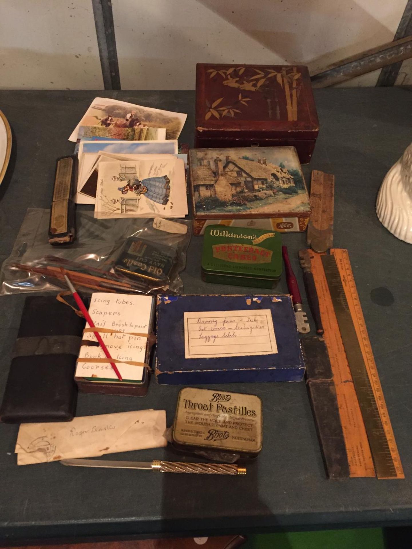 A MIXED SELECTION TO INCLUDE VINTAGE TINS , A TIN OF COLLECTORS STAMPS AND POSTCARDS