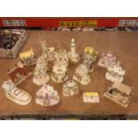 A LARGE SELECTION OF COALPORT ORNAMENTS , TO INCLUDE "THE LIGHTHOUSE " ," THE OLD WOMENS SHOE" "
