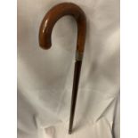 A BAKELITE, LIGHT UP WALKING STICK