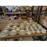 A LARGE " THOMAS " DINNER SERVICE TO INCLUDE SERVING DISHES , COFFEE SET, BUTTER DISH, SALT AND