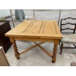 AN EARLY 20TH CENTURY OAK DRAW-LEAF DINING TABLE ON BARLEYTWIST LEGS, 42" SQUARE