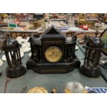 A LARGE DECORATIVE POLISHED SLATE OVER MANTEL CLOCK WITH EMBOSSED COPPER DEPICTING ROMAN SCENES 50CM