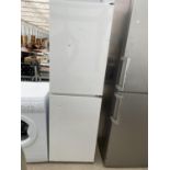 A WHITE BAUMATIC UPRIGHT FRIDGE FREEZER BELIEVED IN WORKING ORDER BUT NO WARRANTY