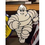 A TIN MICHELIN MAN SIGN