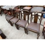 A SET OF FOUR MID 20TH CENTURY JACOBEAN STYLE OAK DINING CHAIRS
