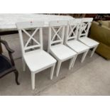 A SET OF FOUR MODERN WHITE PAINTED DINING CHAIRS