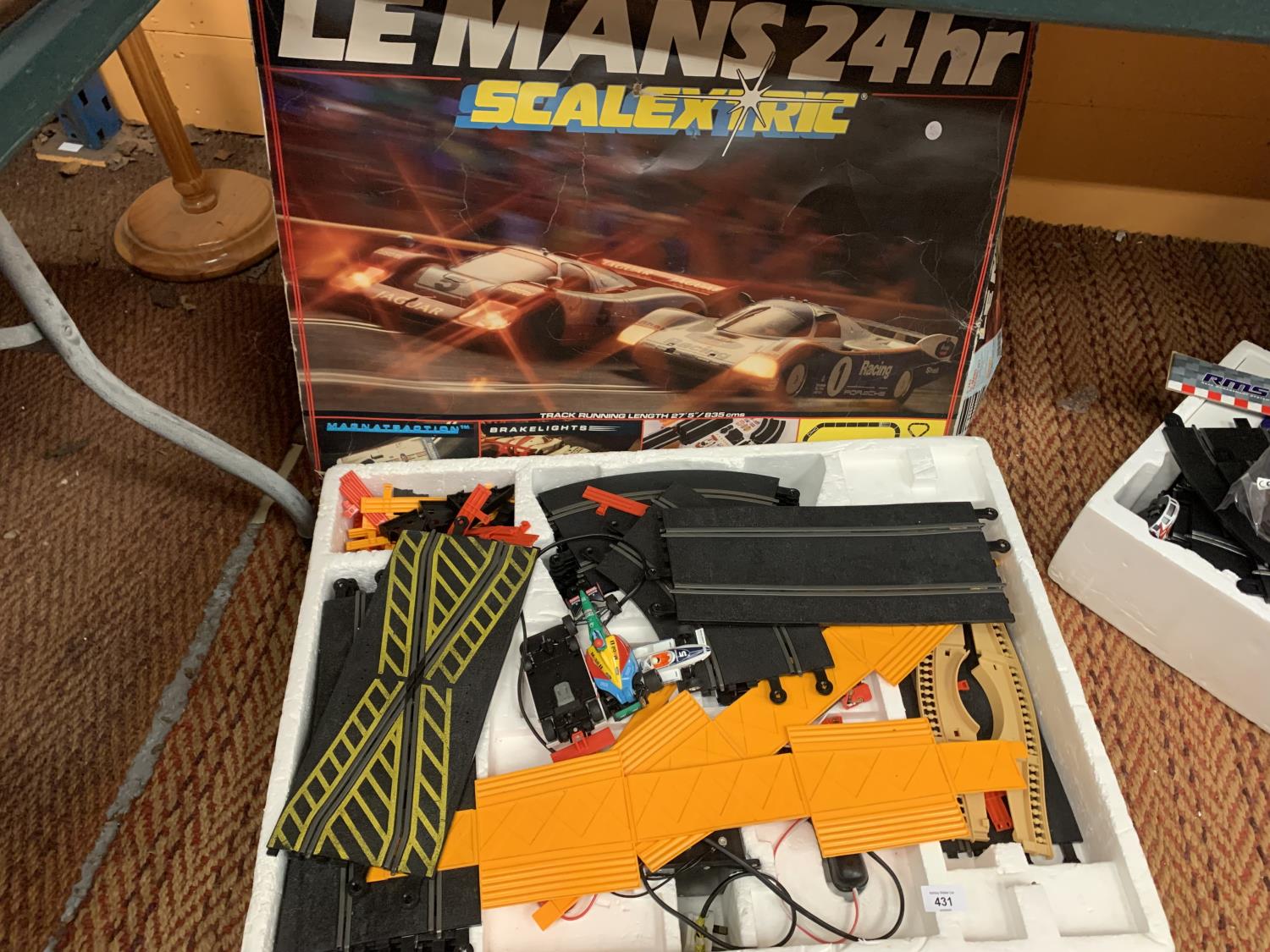 A BOXED LE MANS SCALEXTRIC TRACK AND CARS