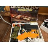 A BOXED LE MANS SCALEXTRIC TRACK AND CARS