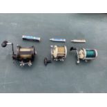 A GROUP OF THREE MULTIPLIER FISHING REELS COMPRISING OF A GARCIA MITCHELL 602, A CAPTAIN MITCHELL