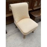 A MODERN BEDROOM CHAIR ON CABRIOLE LEGS