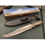 A BOXED STAINLESS STEEL BOWIE HUNTING KNIFE