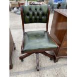 A GREEN LEATHER BUTTON BACK SWIVEL OFFICE CHAIR