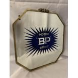 A MOTOR 'BP' SPIRIT BRASS FRAMED MIRROR 36CM X 37.5CM (CHIP TO GLASS)