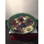 A LARGE MOORCROFT PANSY PATTERN BOWL 25.5CM