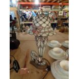 A TIFFANY STYLE TABLE LAMP ATTACHED TO A METAL BASE H:APPROX 60CM