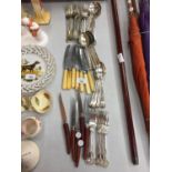 A COLLECTION OF CUTLERY