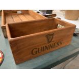 A WOODEN GUINNESS ADVERTISING STORAGE BOX LENGTH 28CM