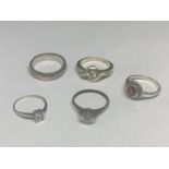 FIVE SILVER RINGS THREE WITH CLEAR STONES