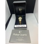 AN AS NEW AND BOXED PULSAR QUARTZ LADIES YELLOW METAL WATCH SEEN WORKING BUT NO WARRANTY