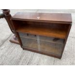 A 1970s GLAZED BOOKCASE