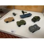 SEVEN UNBOXED DINKY MODEL MILITARY VEHICLES - FOUR ARMOURED CARS, FIELD GUN ETC