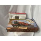 A BOXED HORNBY HARRY POTTER HOGWARTS EXPRESS 00 GAUGE TRAIN SET (R1033) - AS NEW AND UNUSED WITH