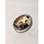 A MARKED 925 SILVER PILL BOX WITH AN ENAMEL EROTIC DESIGN TOP