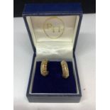 A PAIR OF 9 CARAT GOLD HOOP EARRINGS IN A PRESENTATION BOX