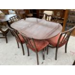 A TWIN PEDESTAL REGENCY STYLE DINING TABLE AND SIX CHAIRS