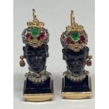 A PAIR OF BLACKAMORE, 14 CARAT GOLD, DIAMOND AND EMERALD EARRINGS IN AN AFRICAN BUST DESIGN