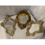 A PAIR OF ORNATE CERAMIC MIRRORS AND A FURTHER GILT FRAMED MIRROR