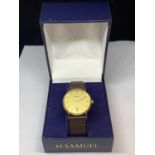 AN AS NEW AND BOXED H SAMUEL WRIST WATCH WITH LEATHER STRAP SEEN WORKING BUT NO WARRANTY