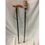 TWO VINTAGE WALKING STICKS ONE WITH A BULLDOG STYLE HEAD