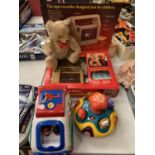 VARIOUS TOYS TO INCLUDE A VTECH SPIN TEACH TOP A SHAPE SORTER, FISHER PRICE TAPE RECORDER AND A