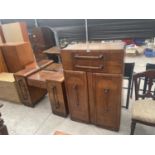 AN EARLY 20TH CENTURY OAK TALLBOY AND DRESSING TABLE