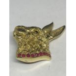 AN 18 CARAT GOLD PLATED SILVER PENDANT IN THE GUISE OF A HARE WITH A RED STONE COLLAR