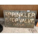 A VINTAGE CAST IRON 'SPRINKLER STOPVALVE' SIGN