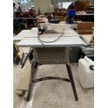 A LARGE TITAN ELECTRIC TABLE SAW