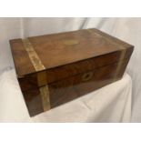 A BANDED MAHOGANY BOX WITH BRASS INLAY (LOCKED NO KEY)