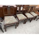 A SET OF FOUR OAK EARLY 20TH CENTURY DINING CHAIRS