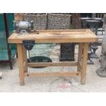 A WOODEN WORK BENCH WITH A HILKA BENCH GRINDER AND RECORD NO.52E BENCH VICE