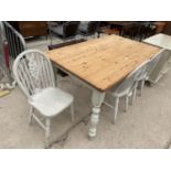 A MODERN PINE KITCHEN TABLE, 60X36", WITH PAINTED BASE AND THREE PAINTED WHEEL BACK CHAIRS