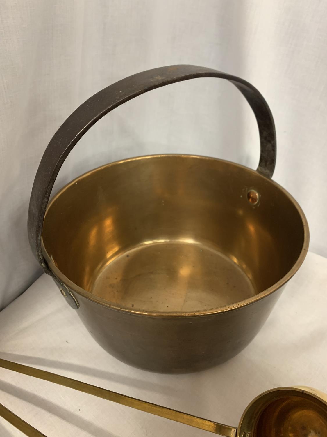 A BRASS JAM PAN AND THREE BRASS LADLES - Image 3 of 3