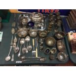 A LARGE QUANTITY OF SILVER PLATED ITEMS TO INCLUDE TEASET, JUGS, VASES, FLATWARE ETC