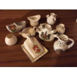 TEN PIECES OF CRESTED WARE TO INCLUDE A MINATURE CHEESE DISH, JUGS, VASES ETC