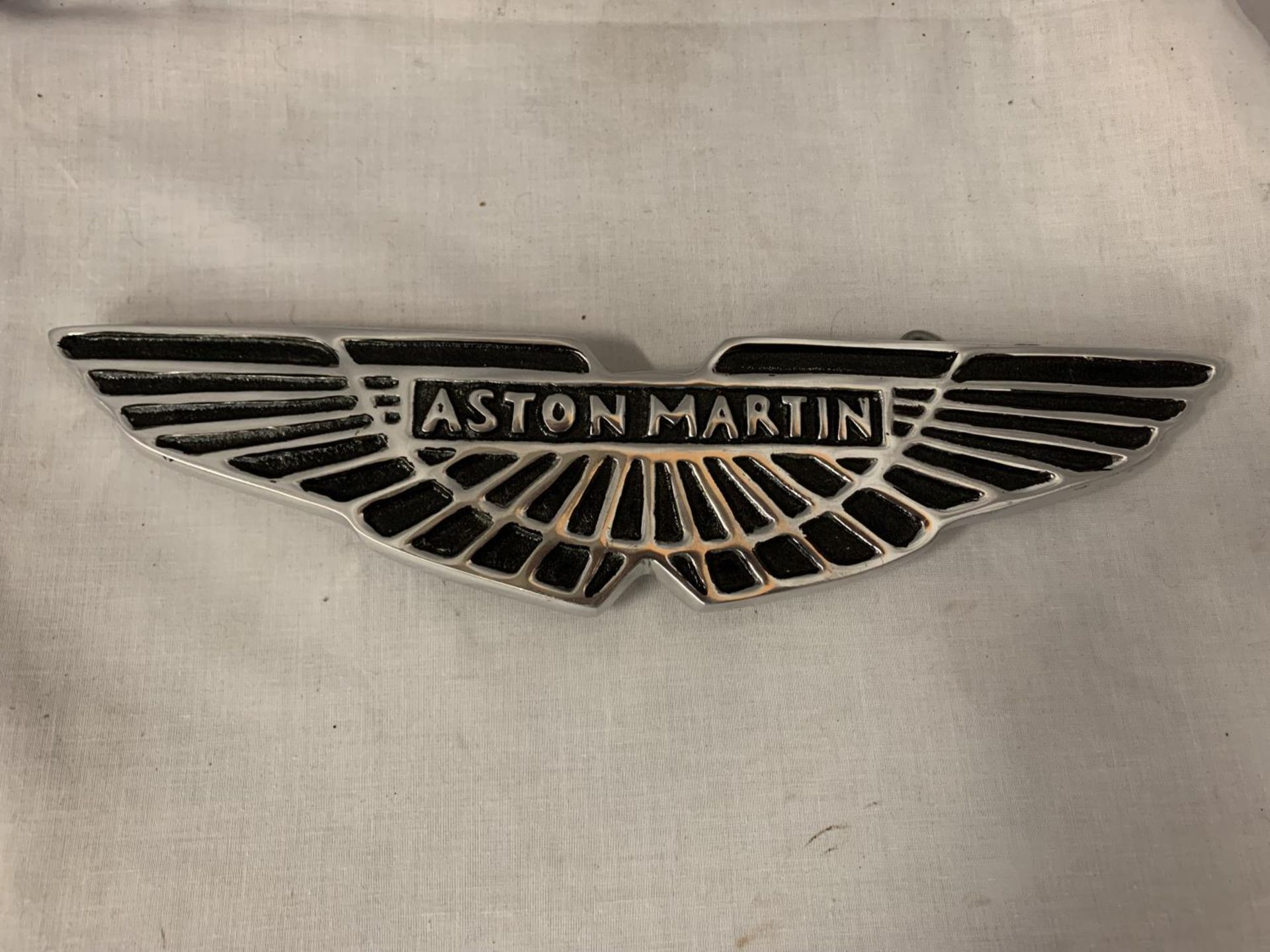 A CAST 'ASTON MARTIN' SIGN