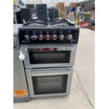 A BLACK AND SILVER MILANO 50 COOKER AND HOB