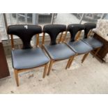 A SET OF FOUR RETRO TEAK DINING CHAIRS WITH WHALE FIN BACKS, HAVING BLACK FAUX LEATHER SEATS AND